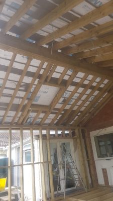 Timber frame extension ridge beam